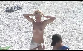 Dancing on a nudist beach